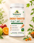 Vedamrit Wellness Energy Booster supplement bottle with fruits and plants in the background